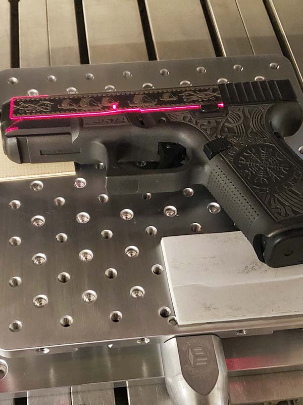 laser engraved guns